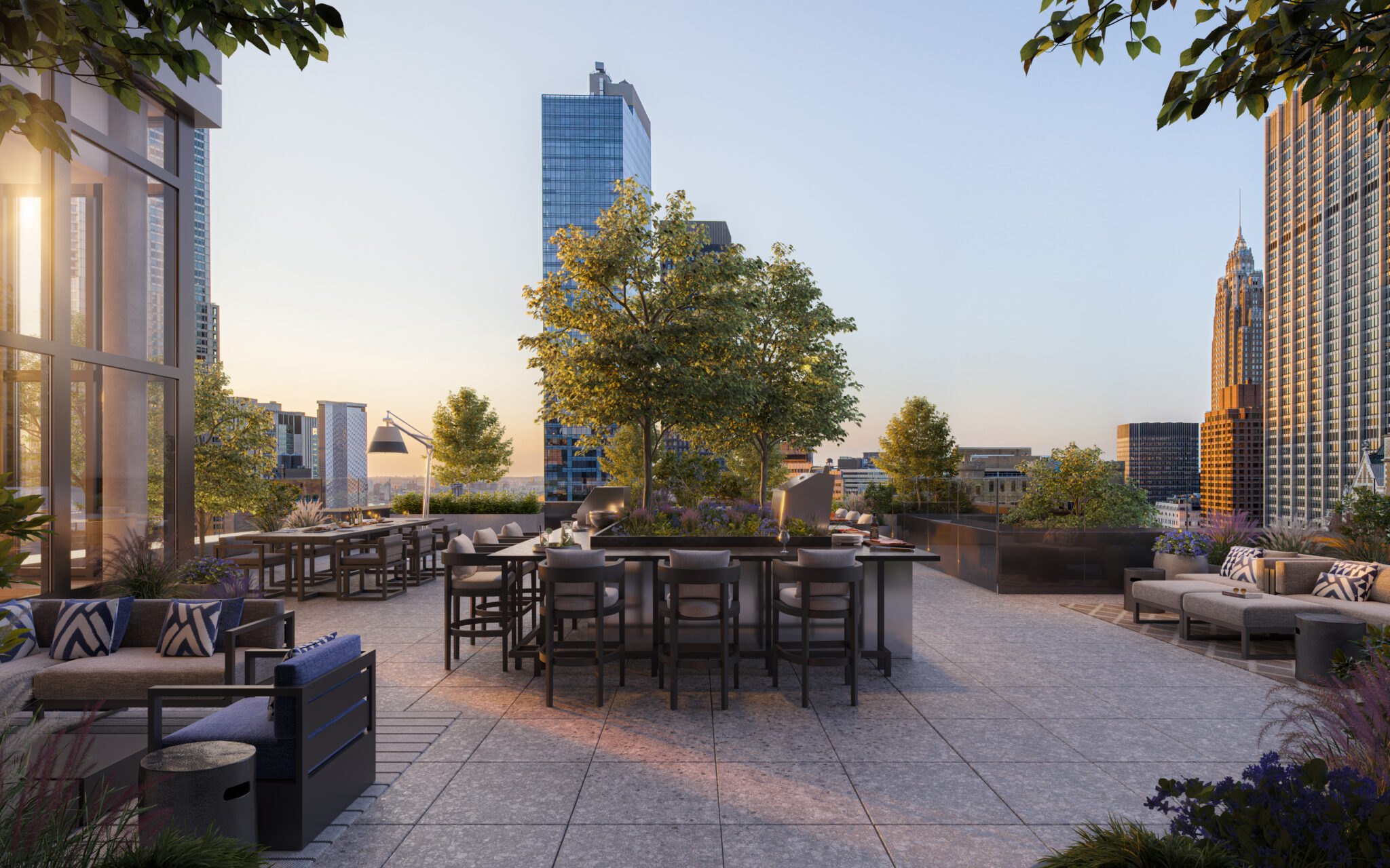 7 Dey outdoor terrace at dusk with many seating options, BBQ station, and expansive NYC views